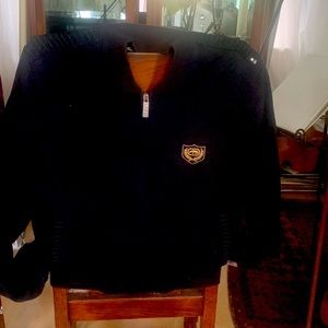 Black cool jacket you can pair with black jeans , pinstripe back with emblem,